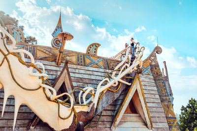 Low angle view of traditional building against sky