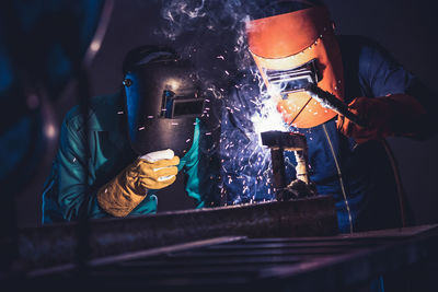 Man working on metal