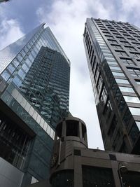 Low angle view of skyscrapers against sky