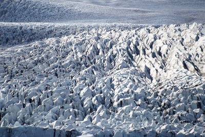 Scenic view of snow covered land