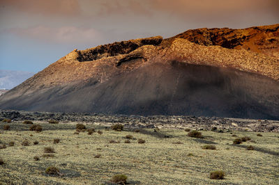 Scenic view of volcanic landscape against sky