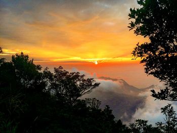 Scenic view of dramatic sky during sunset