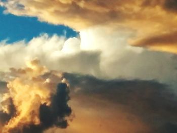 Low angle view of cloudy sky during sunset