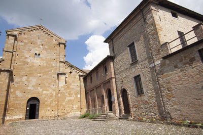 Low angle view of historic building against sky