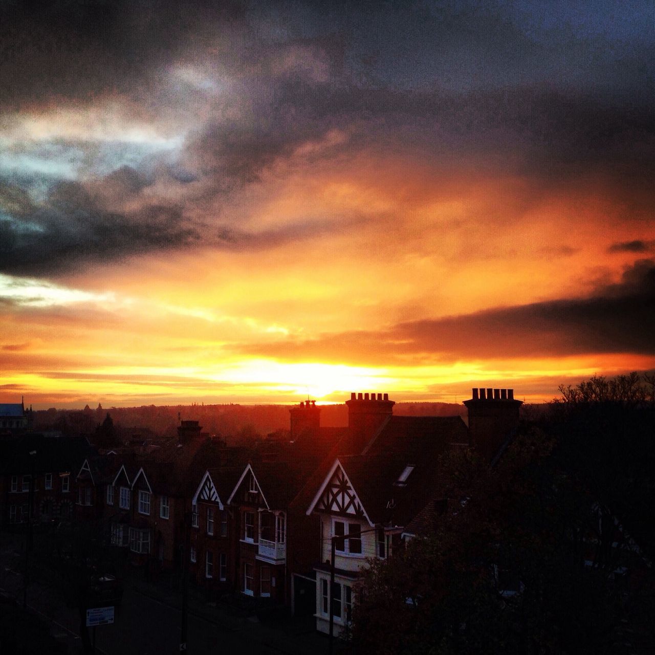 sunset, architecture, building exterior, built structure, orange color, sky, cloud - sky, residential structure, house, dramatic sky, residential building, city, cloudy, residential district, moody sky, silhouette, scenics, beauty in nature, cloud, nature