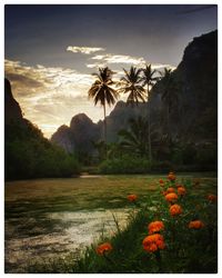 Scenic view of sea against cloudy sky