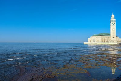 View of sea against blue sky