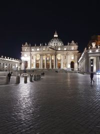 Facade of historic building at night