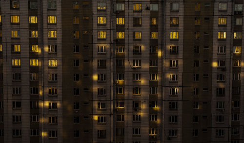 Low angle view of illuminated building at night