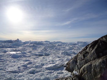 Scenic view of mountains against sky during winter