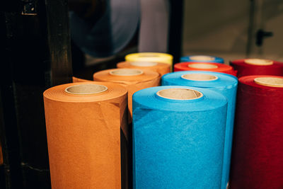 Close-up of multi colored papers on table