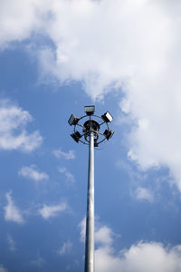 Low angle view of street light against sky