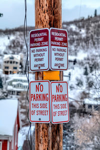 Information sign on snow covered land