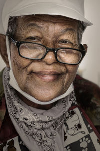 Close-up portrait of smiling young man