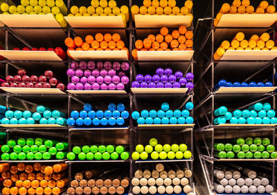 Full frame shot of multi colored pencils for sale in market