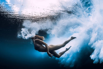 Man swimming in sea