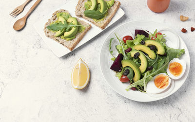 High angle view of breakfast served on table