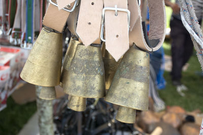 Close-up of padlocks hanging on metal