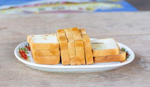 Close-up of breakfast served on table