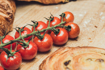 Close-up of tomatoes on cutting board