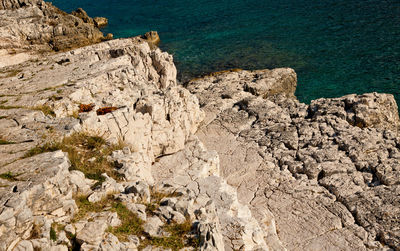 Detail of rock formation washed by the sea for ages. coast line of losinj island, croatia.