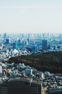 High angle view of buildings in city against sky