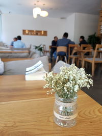 Flowers in vase on table