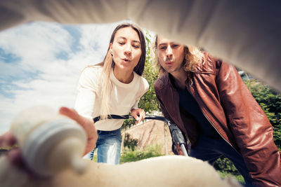 Young couple holding hands