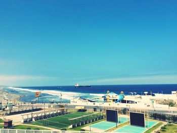 High angle view of sea against blue sky