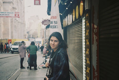 Women standing on street in city