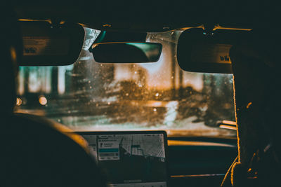 Close-up of car windshield in rainy season