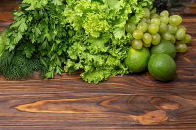 Close-up of green fruits on table