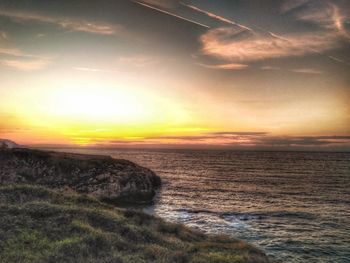 Scenic view of sea against sky during sunset