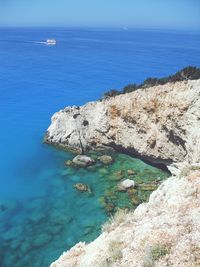 High angle view of rock formation in sea