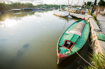 High angle view of fishing boats moored in lake