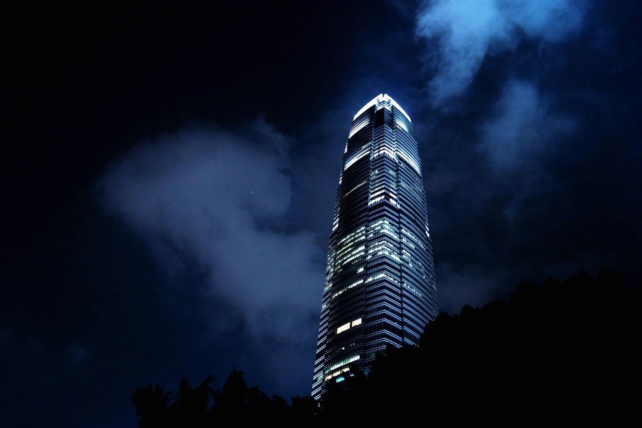 low angle view, sky, tall - high, built structure, architecture, tower, cloud - sky, building exterior, skyscraper, tall, cloudy, dusk, silhouette, modern, night, city, cloud, outdoors, no people, office building