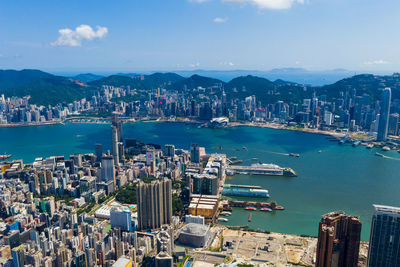 Aerial view of cityscape by bay