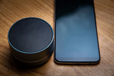 High angle view of smart phone on table