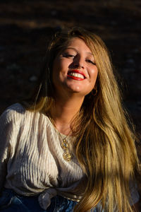 Portrait of a smiling young woman