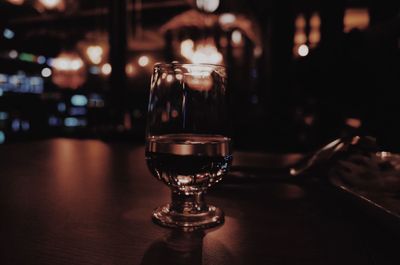 Close-up of beer glass on table