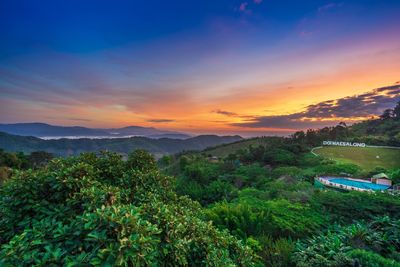 Scenic view of landscape against sky during sunset