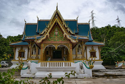 Low angle view of temple against building