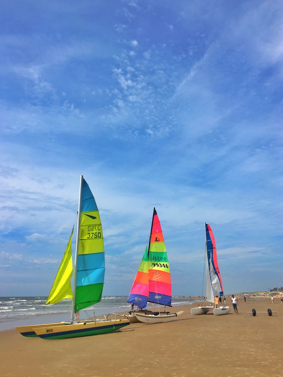 beach, sea, sky, horizon over water, water, shore, tranquility, tranquil scene, cloud - sky, scenics, cloud, blue, nature, beauty in nature, idyllic, outdoors, day, coastline, cloudy, vacations, tourism, ocean, no people, non-urban scene, remote, travel destinations, multi colored