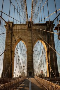 View of brooklyn bridge against sky in city