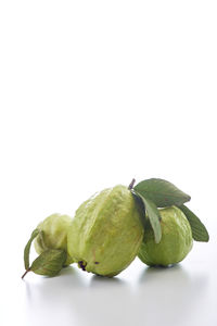 Close-up of fruits against white background