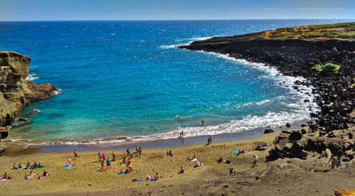 High angle view of people on beach against sky