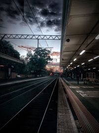 Railroad station platform at dusk