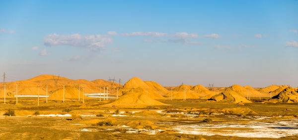 Scenic view of landscape and mountains against sky