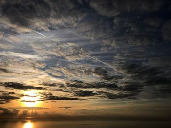 Scenic view of dramatic sky during sunset