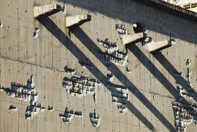 High angle view of shopping cart in city on sunny day